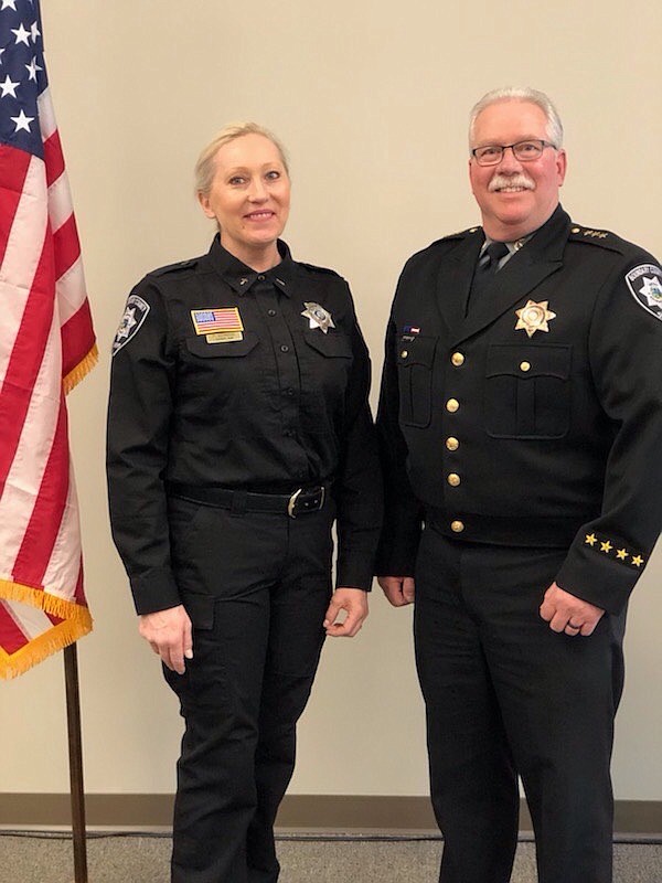 Chaplain Paula DesBiens with Sheriff Dave Kramer.