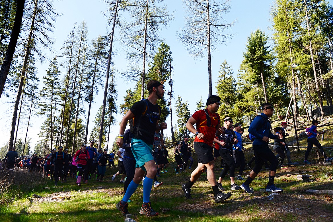 Competitors begin the 13-mile Spartan Beast race at Flathead Lake Lodge in Bigfork on Saturday. (Casey Kreider/Daily Inter Lake)