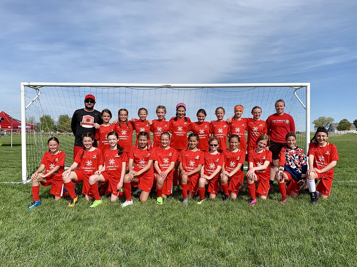 Courtesy photo
The Thorns North FC &#146;08 Girls soccer team traveled to Boise and participated in the Performance Cup. In the front row from left are Georgia Nelson (2 goals), Macy Walters (defended the goal), Eleanor Moss, Allison Carrico (1 goal and 1 assist), Anna Ploof, Savannah Rojo, Ashely Breisacher, Elizabeth Nelson, Teagan Slusher, Adysen Robinson (1 goal and defended the goal) and Alyvia Morris; and back row from left, coach Tony Grimmett, Isabella Grimmett, Sloan Waddell, Ella Pearson (1 assist), Izabella Entzi, Hannah Shafer, Kamryn Kirk, Nora Ryan, Elizabeth Montgomery, Cameron Fischer (3 goals) and coach Taylor Lang.