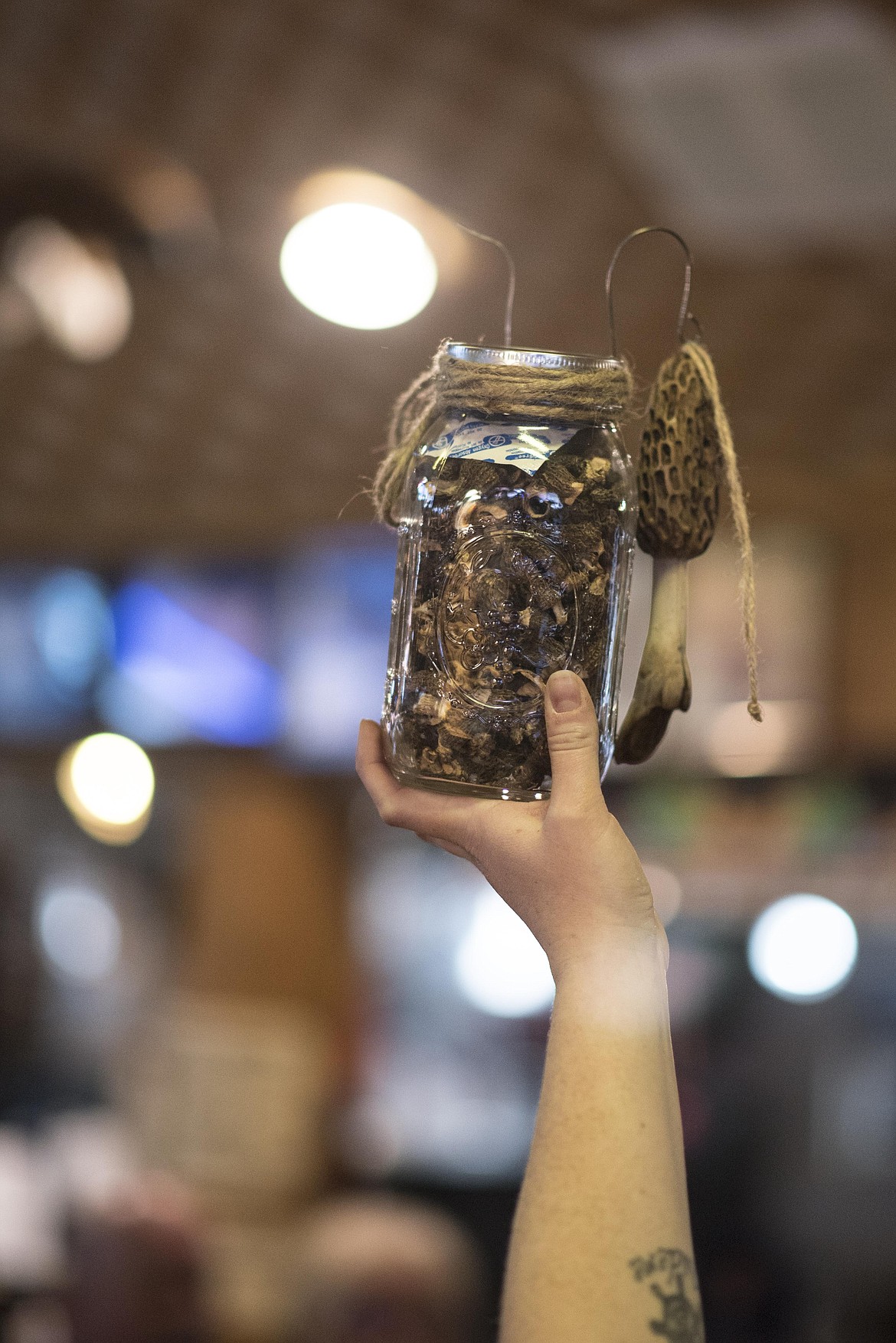 A jar of morels sells for $90 at a Wings fundraiser, Saturday at the Yaak River Tavern &amp; Mercantile. (Luke Hollister/The Western News)