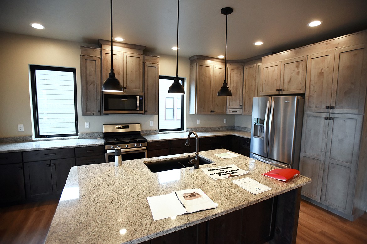 Shown is the kitchen inside the student-built home at 621 Corporate Drive in Kalispell. The  2,129-square-foot, two-story home features three bedrooms and two and a half baths. The community is invited to an open house from 8 a.m. to 8 p.m. May 10. (Casey Kreider/Daily Inter Lake)