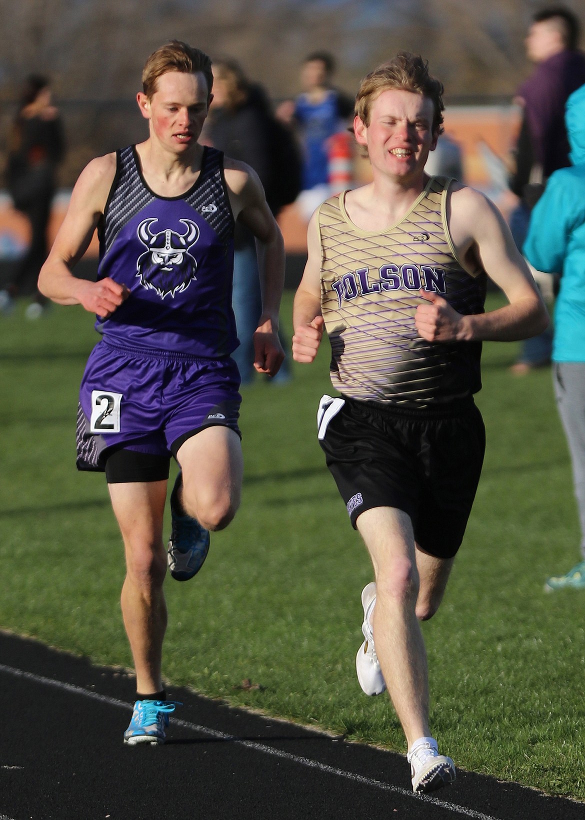 POLSON HIGH School runner QuinStewart compete with Charlo runner Wills Degrandpre in the 800-meter race. Stewart finished with a time of 2 minutes, 5.80 seconds, and Degrandpre had a time of 2 minutes, 9.17 seconds in the Lake County Invitational Thursday afternoon in Polson. (photo courtesy of Bob Gunderson)