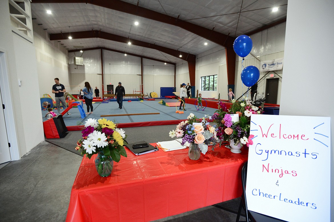 Parents and guardians interact with their children during a Parent/Tot program for ages 1-3 at Glacier Gymnastics on Thursday, May 2. (Casey Kreider/Daily Inter Lake)