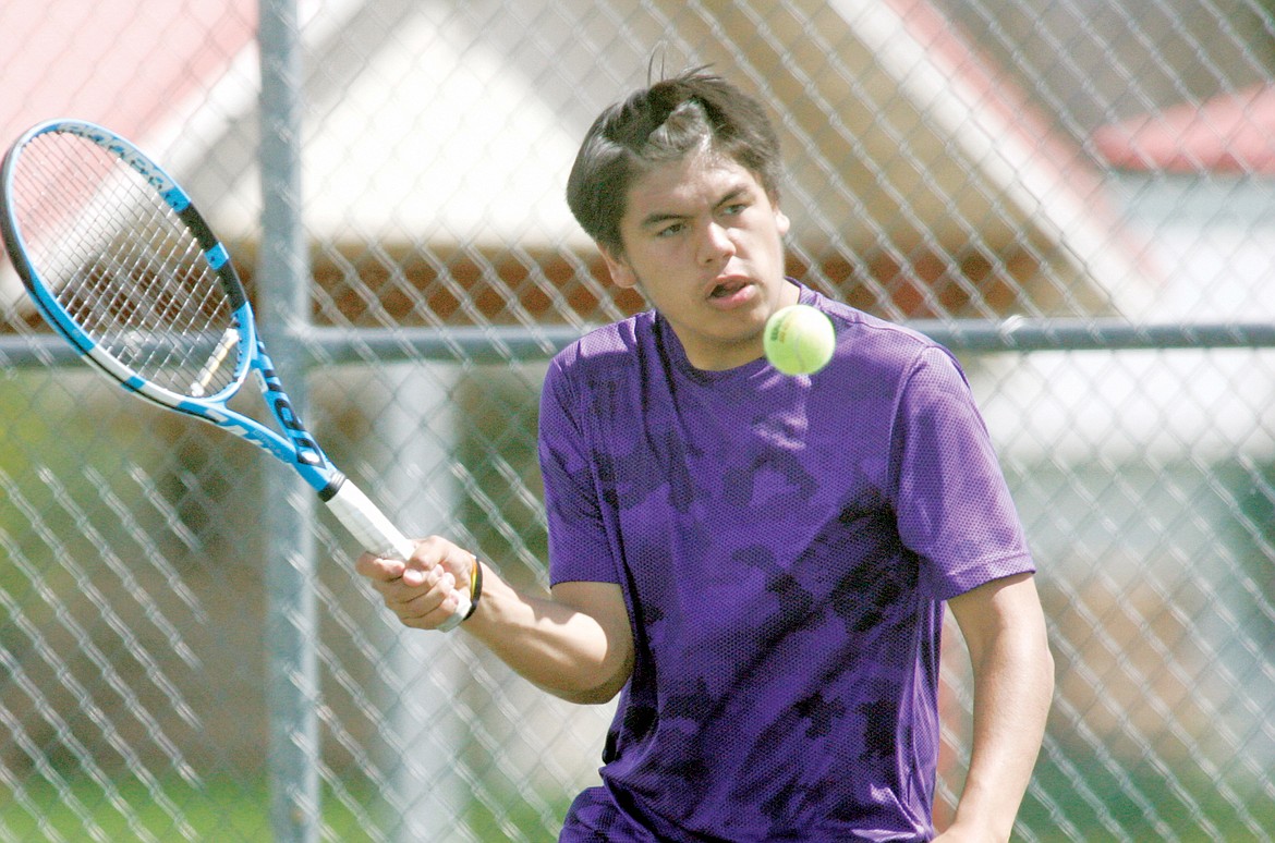 Anton Lefthand vs. Matthew Hock of Stevensville in No. 1 boys singles Saturday at Polson. (Paul Sievers/The Western News)