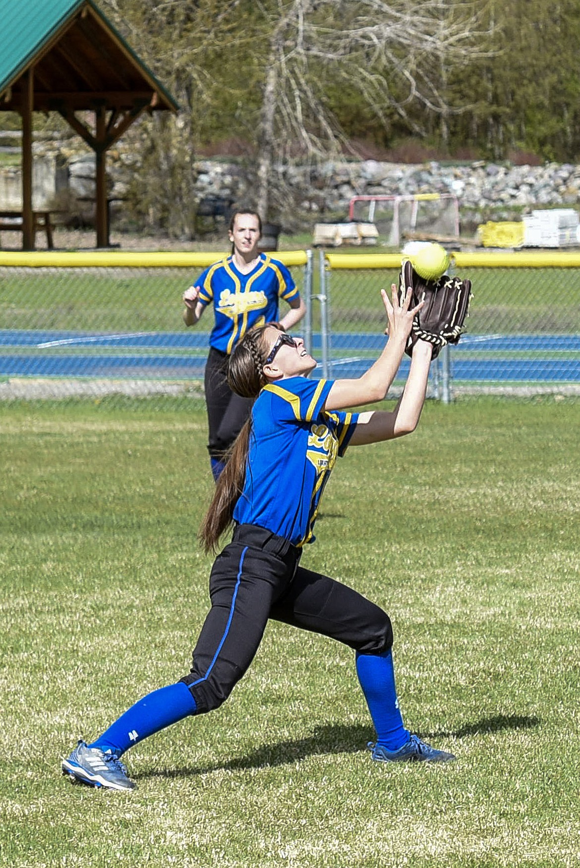 Libby junior outfielder Ashlyn Monigold catches the final out, bottom of the second, during the Libby-Troy varsity game at Troy, April 30. (Ben Kibbey/The Western News)