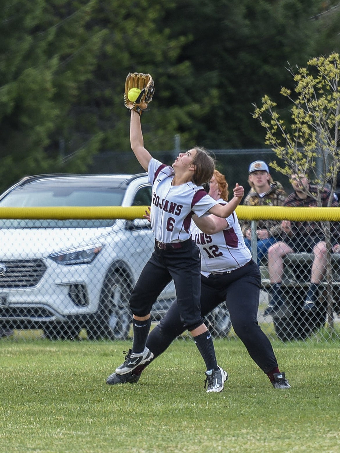 Troy freshman center fielder Adeline Roesler-Begalke catches the first out, top of the first inning, during the Troy-Libby junior varsity game at Troy, April 30. (Ben Kibbey/The Western News)