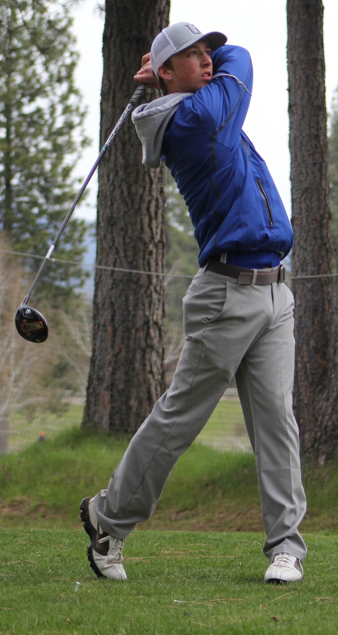 Clark Fork Mountain Cat Danner Haskins swings at the Trestle Creek Golf Tournament in St. Regis on Thursday, May 2. The Mountain Cats claimed the top spot for both the boys&#146; and girls&#146; teams. (Maggie Dresser/Mineral Independent)