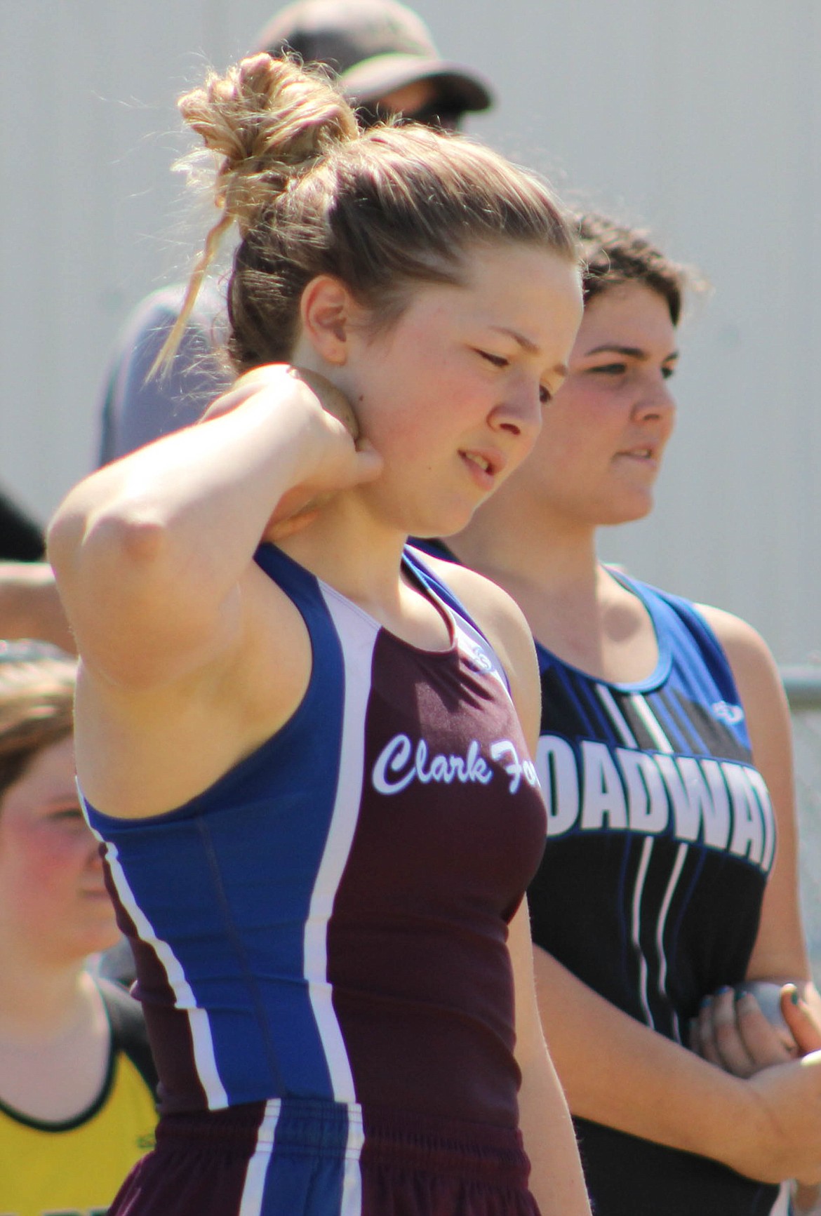 CASSIE GREEN prepares to throw during the shot put event. She placed 10th at the Kim Haines Memorial track meet with 29-03.00. (Maggie Dresser/Mineral Independent)