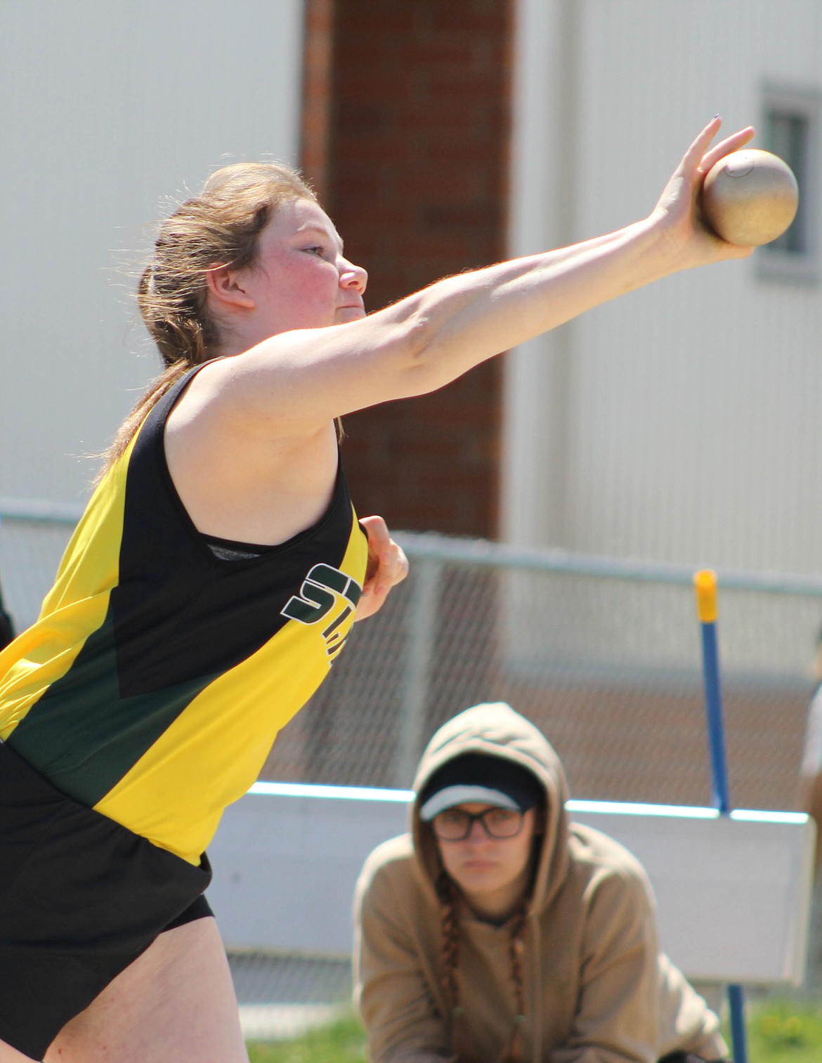GRACE KING throws during the shot put event. She placed 31st with an effort of 24-03.50. (Maggie Dresser/Mineral Independent)
