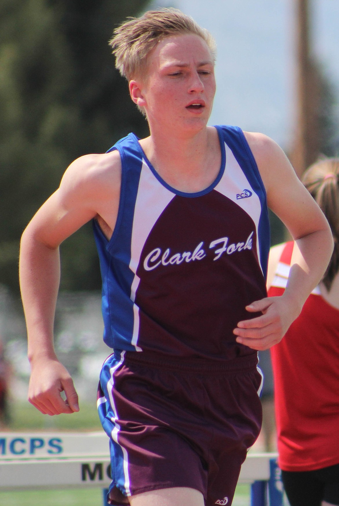 MADS GROENLUNC runs in the 1600 meters at Big Sky High School on Saturday, May 4. He placed 34th with a time of 5:49:00. (Maggie Dresser/Mineral Independent)