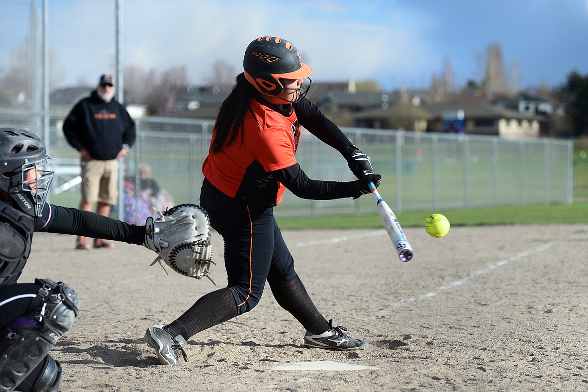 Flathead's Brianna Morales rips a single down the third baseline against Polson at Kidsports Complex on Thursday. (Casey Kreider/Daily Inter Lake)