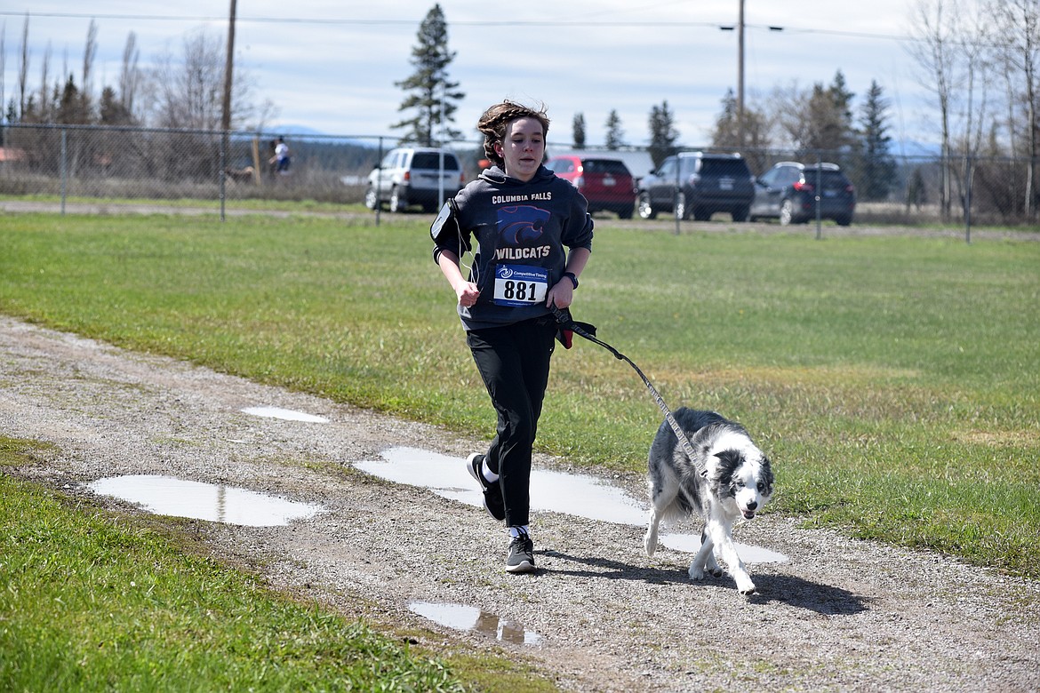 Runners and their dogs participated in the WAG Race Sunday morning beginning and ending at the WAG dog park. The race is annual fundraiser for the park.  (Heidi Desch/Whitefish Pilot)