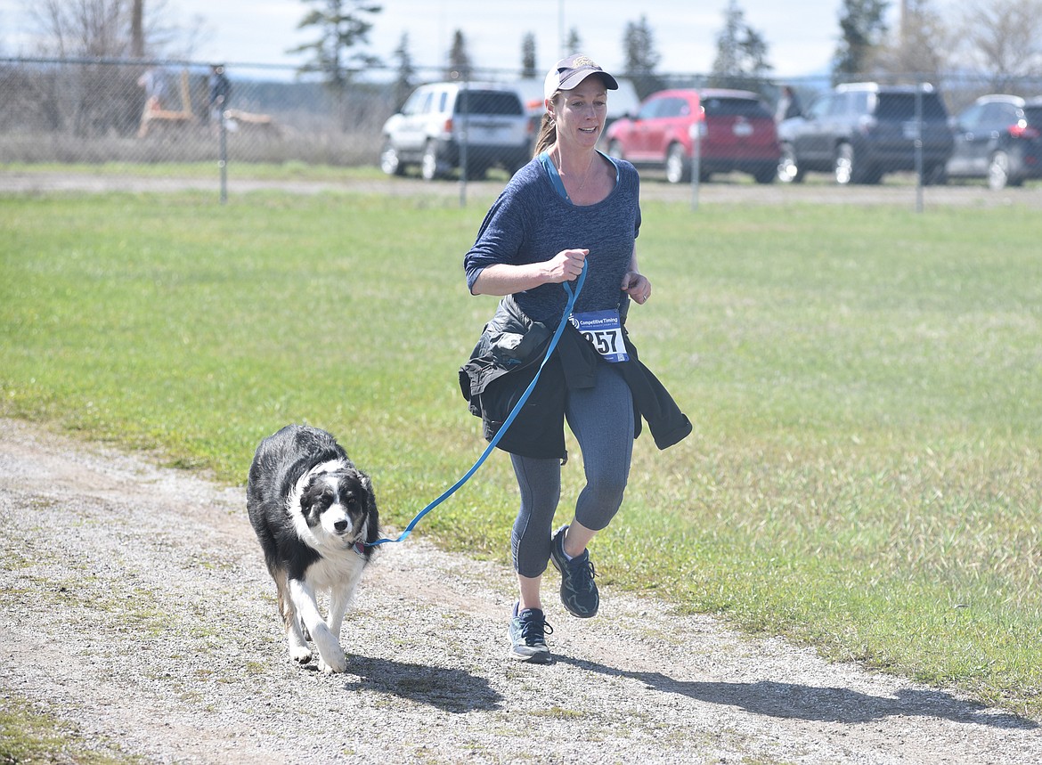 Runners and their dogs participated in the WAG Race Sunday morning beginning and ending at the WAG dog park. The race is annual fundraiser for the park.  (Heidi Desch/Whitefish Pilot)