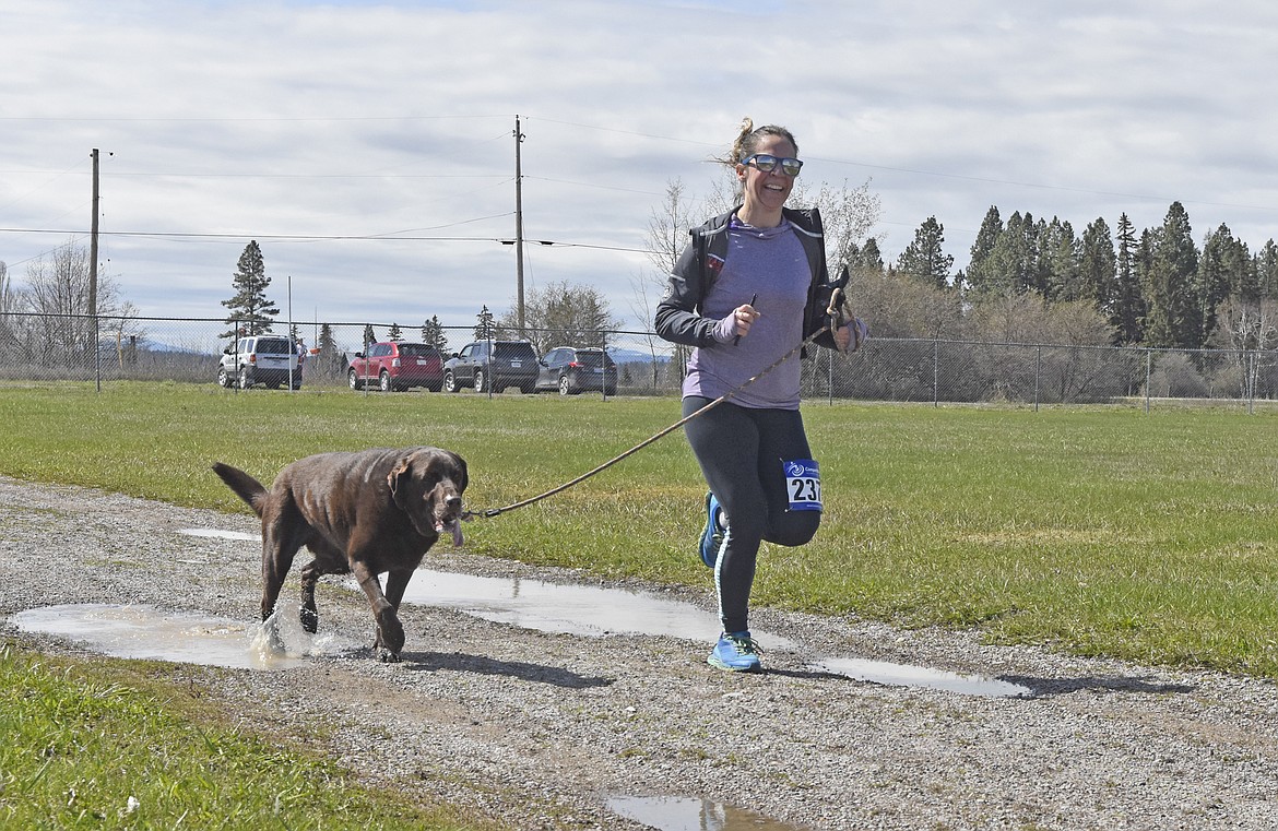 Runners and their dogs participated in the WAG Race Sunday morning beginning and ending at the WAG dog park. The race is annual fundraiser for the park.  (Heidi Desch/Whitefish Pilot)