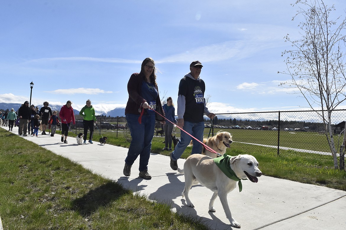 Runners and their dogs participated in the WAG Race Sunday morning beginning and ending at the WAG dog park. The race is annual fundraiser for the park.  (Heidi Desch/Whitefish Pilot)