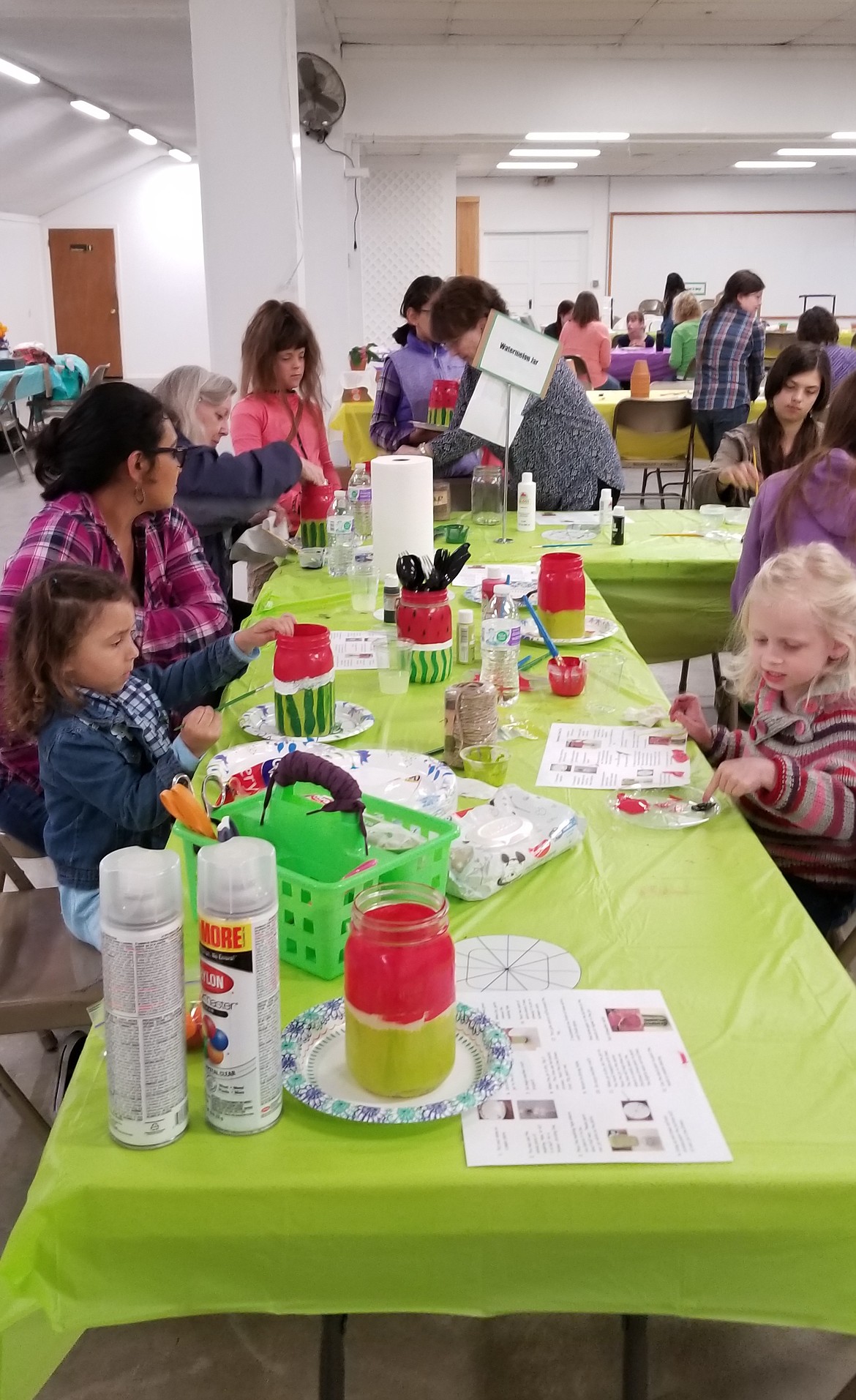 Women and children gathered at the fairgrounds to participate in a crafting event called CREATE.