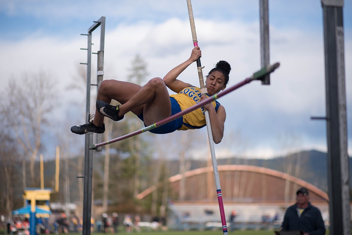 Olivia Gilliam-Smith clears the bar while pole vaulting, Tuesday at the Lincoln County Track Meet in Libby. (Luke Hollister/The Western News)