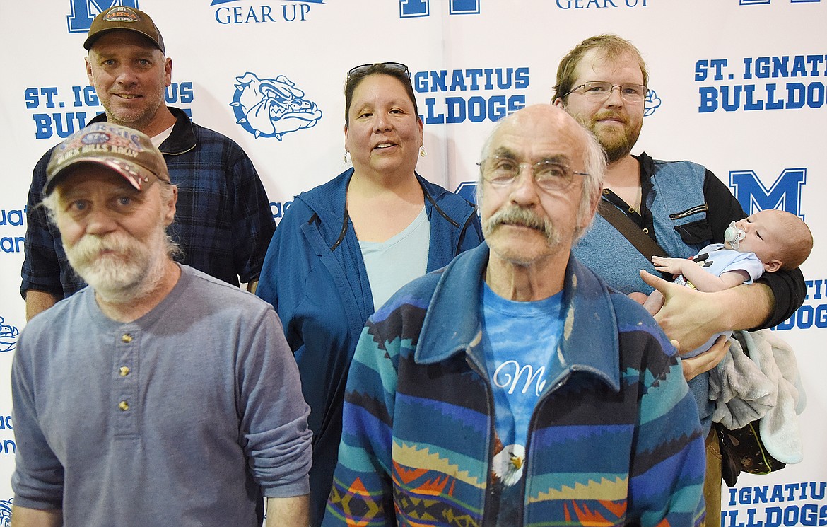 WINNERS OF $100 gas cards in a drawing during the Community Showcase are, front row from left, Gregg Doughtery and James Gardipe; and back row, Jeffrey Brander, Debra Tailfeathers and Craig Wheeler.