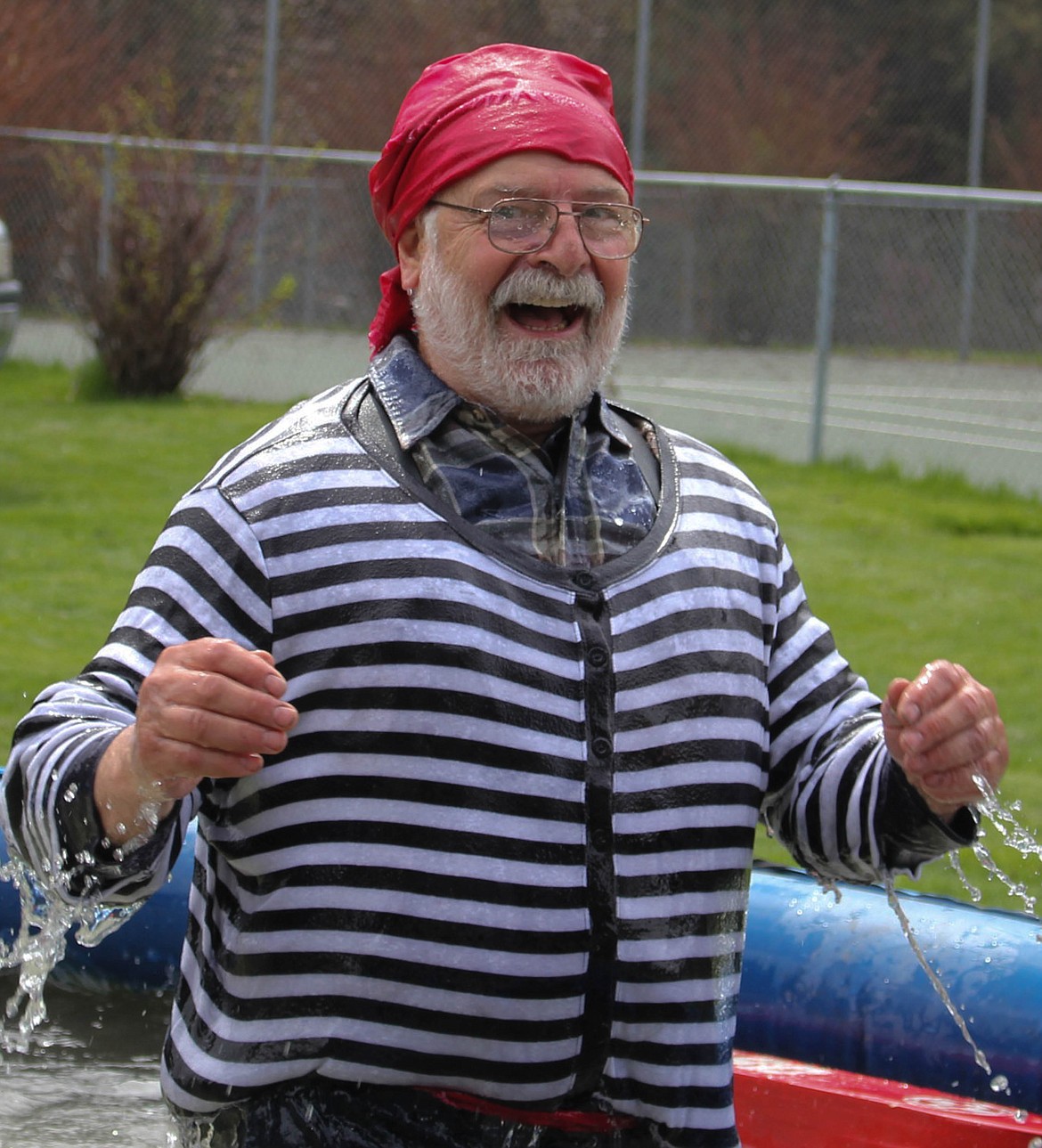 PIRATE TOM McCloskey braces the cold after plunging into the water at the Walk the Plank fundraiser in Superior. (Maggie Dresser photos/Mineral Independent)