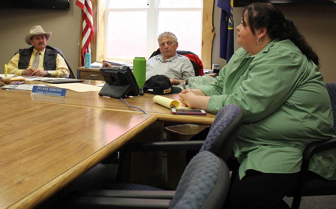 MINERAL COUNTY Commissioners Roman Zylawy and Duane Simons listen to County Attorney Ellen Donohue at the Detention Center update meeting on Friday, April 26. (Maggie Dresser/Mineral Independent)