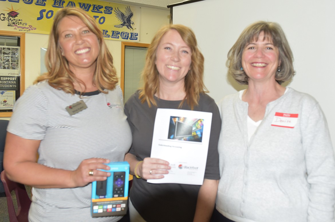 FROM LEFT, Kina Kuhn and another Blackfoot Telecommunications representative, and Denise Loran of WaterColorCT helped take the mystery out of &#147;SmartTVs&#148; and streaming devices at the first &#147;Understanding Streaming&#148; workshop in Thompson Falls last week. (Carolyn Hidy/Clark Fork Valley Press)