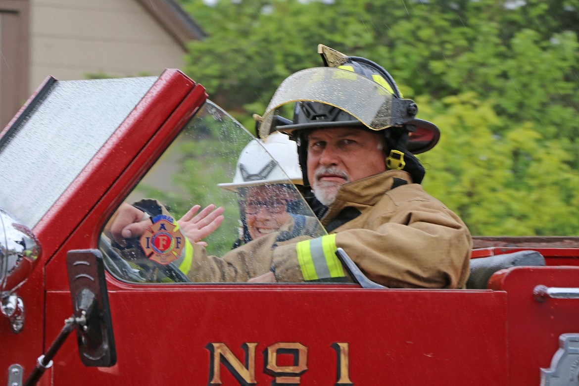 (Photo by CAROLINE LOBSINGER)Among the classic rides taking part in Friday's Lost in the &#146;50s parade is the city of Sandpoint's antique fire engine.