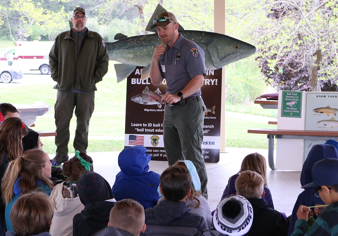 (Photo by MARY MALONE)
An expert from Idaho Fish and Game talks to Washington Elementary fifth graders about how to identify cutthroat trout during the 24th annual Pend Oreille Water Festival on Friday.