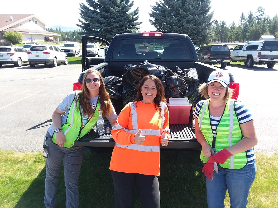 Courtesy photo
From left, Kaci Parson, Tonee Trzcinski and Andrea Door smile for the camera Tuesday after volunteering time to pick up trash on the side of the road near Garwood Elementary School, where Trzcinski has been working to clear garbage and safely dispose of needles that have been thrown from car windows. &#147;Found one hypodermic needle 200 yards from the school,&#148; Trzcinski reported.