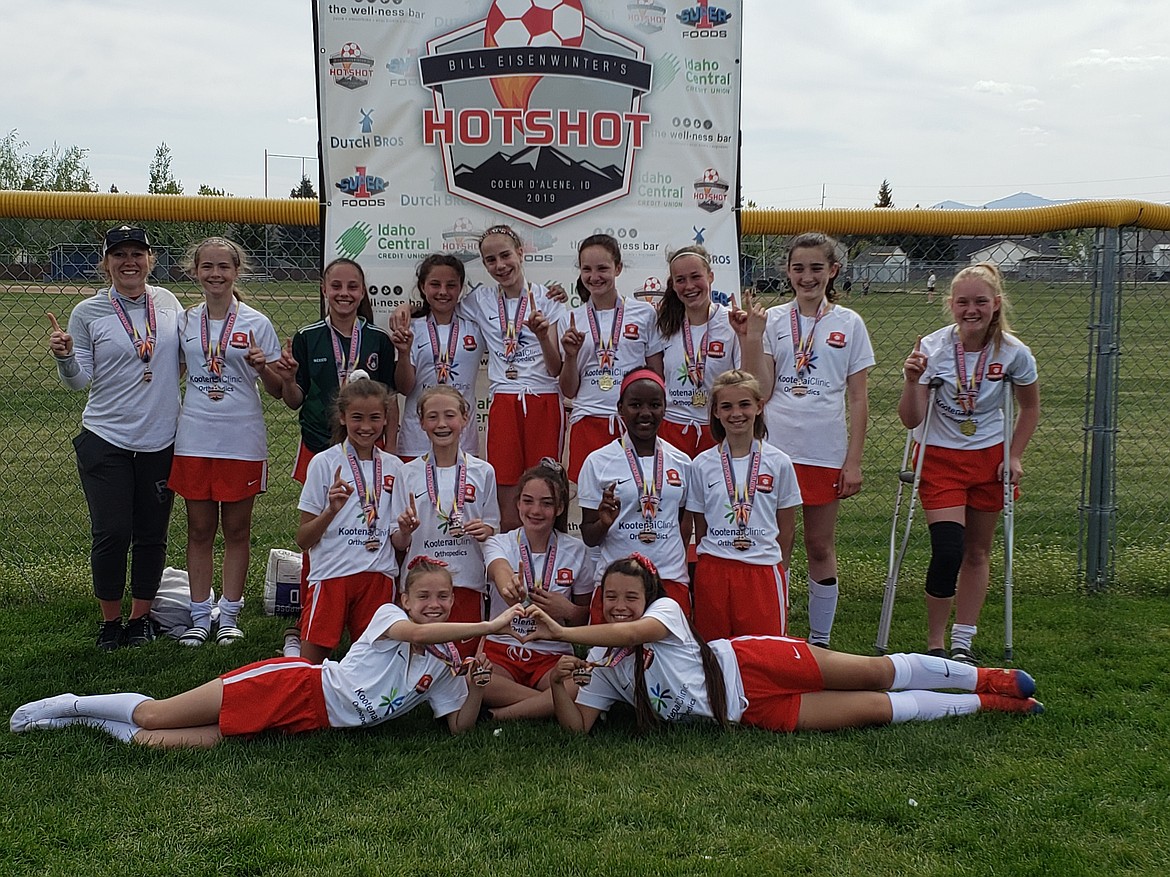 Courtesy photo
The Thorns North FC 06 Red Girls soccer team took first place in the  Bill Eisenwinter Hot Shot  Tournament this past weekend. On Friday the Thorns beat the Sandpoint Strikers FC 06 girls 7-1. Elliana Rietze, Madeline Daigle, Naomi Kessler, Emerson Duncan, Izabella Douglas each had a goal and Lucy Simpson had 2 goals for the Thorns. The Thorns then beat the Boise Thorns 07 5-2 on goals by Elliana Rietze, Taylor Miller, Naomi Kessler, and Elliana Rietze, with an assist from Lucy Simpson. The Thorns then beat the Valley Elite FC 9-0, on goals by Violet Andrews with an assist from Elliana Rietze, Emerson Duncan, Macie Lilyquist, Devon Pirwitz, Naomi Kessler with an assist from Lucy Simpson, Naomi Kessler with another 2 and Izabella Douglas. In the final game, the Thorns beat Flathead Valley United 7-1 on goals by Madeline Daigle, Lucy Simpson to Macie Lilyquist, Madeline Daigle, Elliana Rietze to Naomi Kessler, Lucy Simpson, and Elliana Rietze to Isabella Douglas. In the front row from left are Taylor Miller, Emily Medina and Izabella Douglas; second row from left, Elliana Rietze, Kaylie Smart, Naomi Kessler and Lucy Simpson; and back row from left, coach Kandace Leliefeld, Violet Andrews, A Caja-Lynn Scott, Jillian-Kate Scott, Devyn Pirwitz, Paisley Goings, Macie Lilyquist, Madeline Daigle and Emerson Duncan.