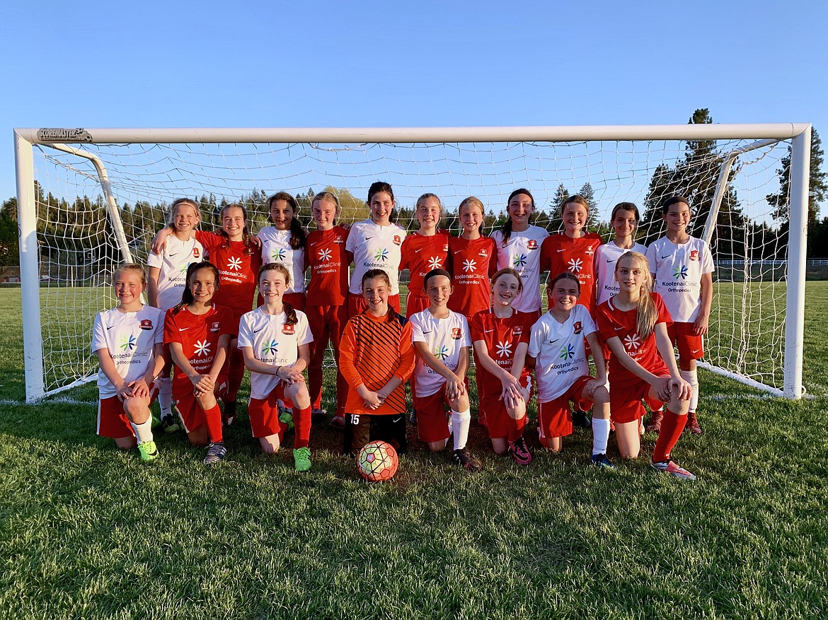 Courtesy photo
The Thorns North FC 08 Girls Green soccer team played in the Bill Eisenwinter Hot Shot Tournament last weekend. On Friday evening, TNFC Green lost to Moscow United SC G08 3-2. Kamryn Kirk had 1 goal and 1 assist. Savannah Rojo had 1 goal. Macy Walters was in goal.
On Saturday morning, TNFC Green lost to Boise Thorns 09GP 3-0
On Sunday morning, TNFC Green beat Idaho Rush 08 Black in the consolation game 3-2. Nora Ryan and Ashley Breisacher each had 1 goal in regular play. Nora Ryan, Izabella Entzi, Sloan Waddell and Cameron Fischer each made penalty kicks during the PK shootout. Macy Walters strongly defended TNFC&#146;s goal. Thorns North FC 08 Girls Green and Yellow teams, front row from left, Anna Ploof, Savannah Rojo, Eleanor Moss, Macy Walter, Elizabeth Nelson, Teagan Slusher, Georgia Nelson and Elizabeth Montgomery; and back row from left, Ella Pearson, Sloan Waddell, Allison Carrico, Cameron Fischer, Hannah Shafer, Izabella Entzi, Nora Ryan, Alyvia Morris, Kamryn Kirk, Isabella Grimmett and Adysen Robinson. Not pictured is Ashley Breisacher.