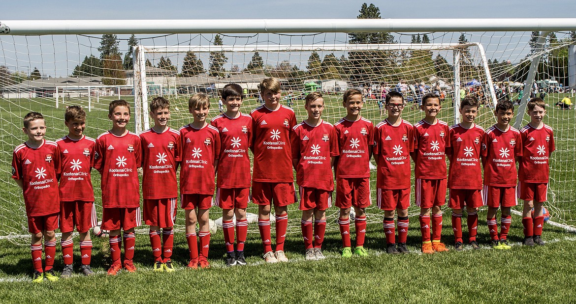 Courtesy photo
The Timbers North FC 08 Green boys soccer team competed in last weekend&#146;s Bill Eisenwinter Hot Shot Tournament. On Friday evening they played Sandpoint Strikers FC Treman and won 8-0. Mitchell Rietze and Wyatt Carr each scored twice. Drake Flowers, Reese Crawford, and Canon St John each scored once. Reilly Smith and Jaxon Fantozzi each had an assist. Saturday morning they defeated FC Missoula 08B Fines 5-1. Parker Sterling and Jack Jenkins each scored twice. Drake Flowers scored once. Saturday afternoon they were beaten 2-1 by Flathead Force Green 08B. The lone goal was scored by Mitchell Rietze. Goalkeepers for the tournament were Reese Crawford, Mitchell Rietze, Preston Samayoa, and Collin Storey. Coaches are Ryan Flowers and Tarragh Carr. From left are Karter Engebretsen, Colton Rush, Drake Flowers, Parker Sterling, Reilly Smith, Wyatt Carr, Collin Storey, Reese Crawford, Mitchell Rietze, Jaxon Fantozzi, Jack Jenkins, Ben Mello, Preston Samayoa and Canon St. John. Not pictured are Kaden Duffield and Griffin Patterson.