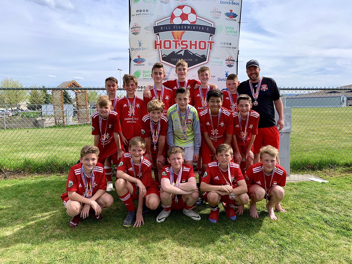 Courtesy photo
The Timbers North FC Boys 06 Red soccer team played in the Bill Eisenwinter Hot Shot Tournament this past weekend. On Saturday morning, Timbers North FC B06 Red beat FC Missoula 05B Lund 13-0. Kason Pintler had 3 goals and 1 assist. Haidyn Jonas, Connor Jump, Kai Delio and Braden Latscha each had 2 goals. Connor Mongan and Harper Barlow each had 1 goal. Kai Delio had 2 assists. Gavin Samayoa, Connor Jump, Noah Waddell and Harper Barlow each had 1 assist. Braden Latscha and Connor Jump were in goal for the shutout. On Saturday afternoon, Timbers beat Flathead SC C-Falls Wildcats Black 6-1. Haidyn Jonas led Timbers with 3 goals, Max Entzi, Jacob Molina and Kai Delio each had 1 goal. Kason Pintler, Connor Jump, Haidyn Jonas, Brayden Ristic, Jacob Molina, Gavin Samayoa and Noah Waddell each had an assist. Braden Latscha was in goal for TNFC. On Sunday morning, Timbers played Boise Timbers 06B Red in the semifinals and won 6-1. Kason Pintler, Noah Waddell, Connor Jump, Jacob Molina, Haidyn Jonas and Kai Delio each had a goal. Haidyn Jonas, Jacob Molina and Noah Waddell each had 1 assist. Braden Latscha was in goal. On Sunday afternoon, Timber North FC B06 Red lost 3-2 in the championship game to Flathead Valley Green. Ben Hannigan-Luther and Haidyn Jonas each had 1 goal. Jacob Molina had 2 assists. Braden Latscha was in goal for TNFC. In the front row from left Gavin Samayoa, Aidan Rice, Connor Jump, Brayden Ristic and Harper Barlow; second row from left, Haidyn Jonas, Connor Mongan, Braden Latscha, Chief Natatqn Allan and Noah Waddell; and back row from left, Kason Pintler, Lachlan May, Kai Delio, Max Entzi, Jacob Molina, Ben Hannigan-Luther and coach Nick Funkhouser.