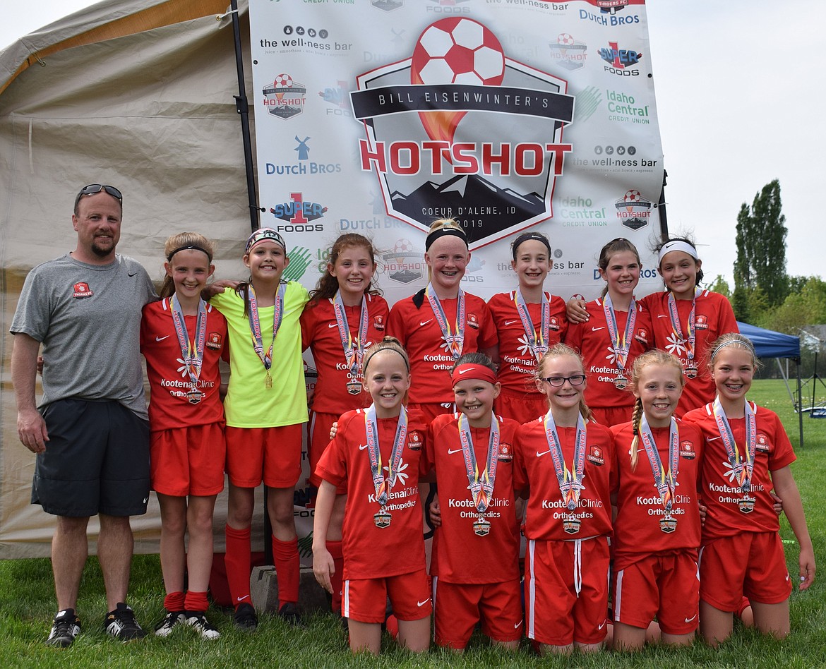 Courtesy photo
The Thorns North FC 07 girls soccer team finished first in the gold division at the Bill Eisenwinter Hot Shot Tournament this past weekend. The Thorns lost in the tournament opener to Missoula Strikers Red 2007G-CL 5-4 but went on to shut out Helena Arsenal SC Blue 2007G-CL 3-0 Saturday afternoon, advancing to the semifinals on Sunday. The Thorns beat Hells Canyon FC 07 Steele 3-1 to play in the finals against Sandpoint Strikers FC Brinkmeier, where they won 2-0 to take home gold medals. Goals during the tournament were scored by Paige Hunt (1), Libby Morrisroe (1), Lily Bole (1), Kennedy Hartzell (1), Rachel Corette (2), and Natalie Thompson (6). In the front row from left are Lily Bole, Riley Brazle, Paige Hunt, Kyndall Dolin and and Rachel Corrette; and back row from left, coach Kirk Hartzell, Natalie Thompson, Ellie McGowan, Evelyn Bowie, Kennedy Hartzell, Lydia Lehosit, Libby Morrisroe and Annabelle Rogers.