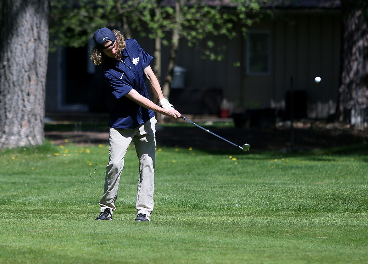 LOREN BENOIT/Press
Lake City senior Greyden Lee hits an iron shot to the sixth green during last Monday&#146;s 5A Region 1 tournament at the Coeur d&#146;Alene Golf Club.