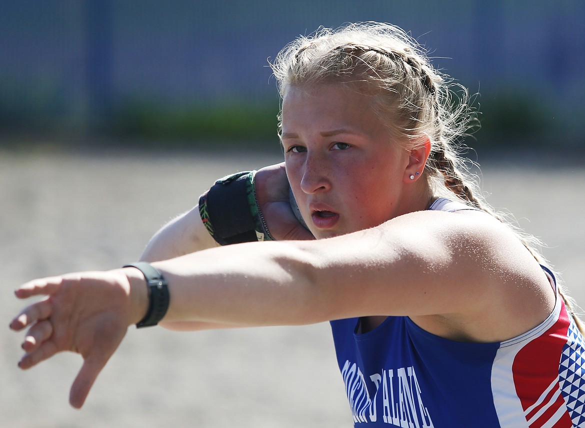 Coeur d&#146;Alene&#146;s Kaitlyn Ward concentrates before releasing the shot put at Thursday&#146;s 5A Region 1 track and field meet.