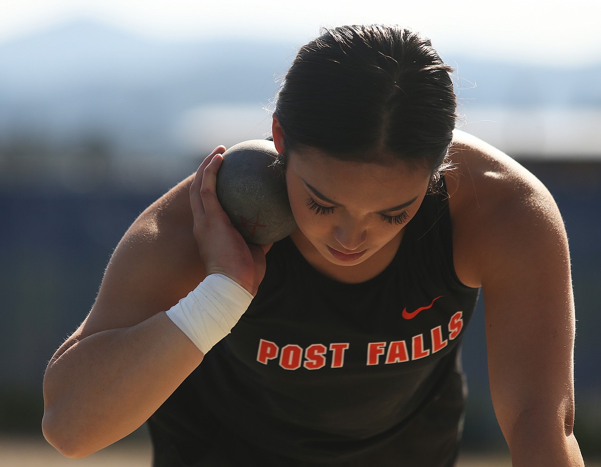 Tegan Uemoto of Post Falls competes in the shot put at Thursday&#146;s 5A Region 1 track and field meet.