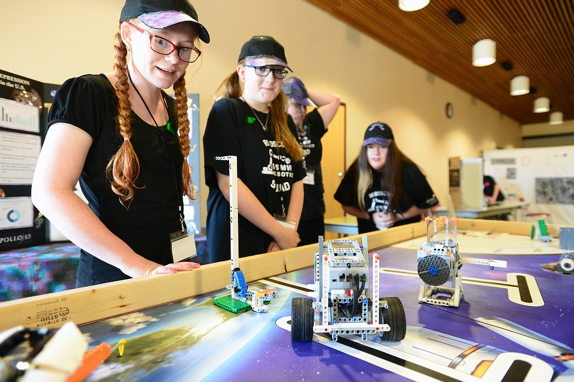 The RoboScout Squad, from left, Zia Walker, Lexi Nunnally, Bree Canavan and Jessie Chadwick, all of Kalispell, at the Code Girls United Northwest Regional App Challenge at Flathead Valley Community College on Saturday, May 11. (Casey Kreider/Daily Inter Lake)