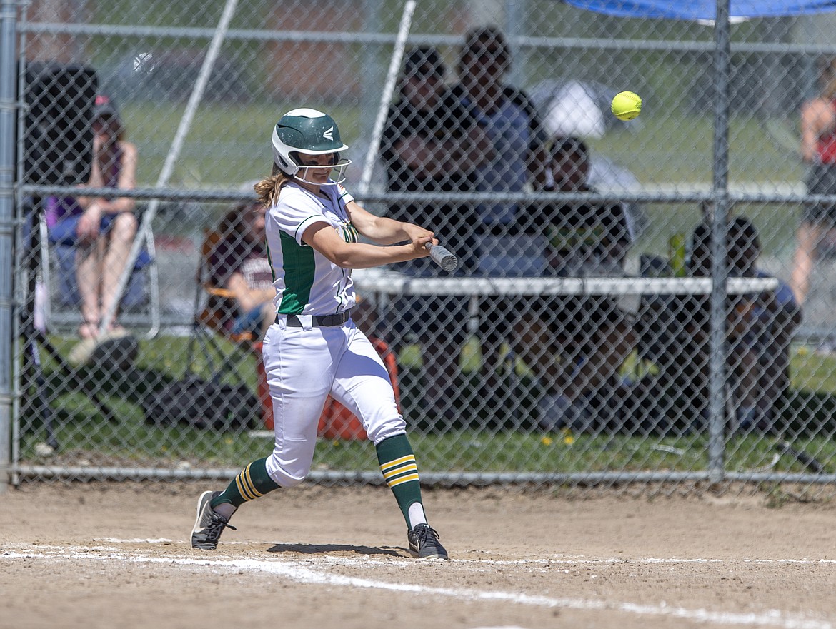 Erika Gallus of Lakeland hits a walk-off three-run home run in the fifth inning to beat Sandpoint 15-5 in the 4A Region 1 softball championship game Saturday in Rathdrum.

Photo by JASON DUCHOW PHOTOGRAPHY