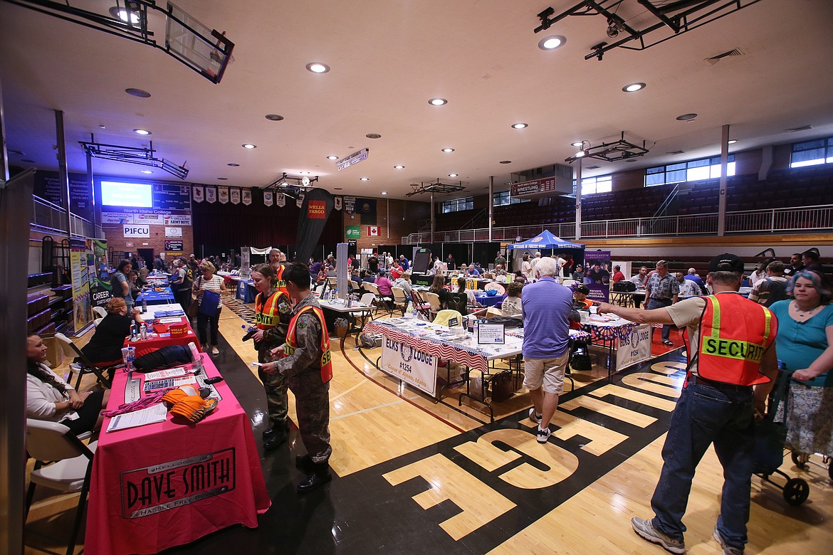 More than 70 vendors and about 100 volunteers spent their Saturday morning giving back to area veterans during the 26th annual North Idaho Veterans Stand Down in the North Idaho College gym. (DEVIN WEEKS/Press)