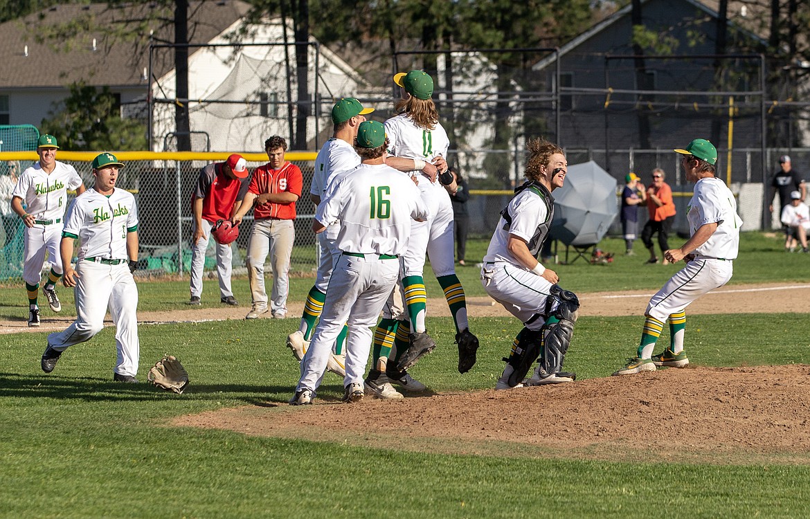 Photo by JASON DUCHOW PHOTOGRAPHY
Lakeland celebrates after beating Sandpoint 5-4 in the deciding game of the 4A Region 1 baseball championship series Friday in Rathdrum.