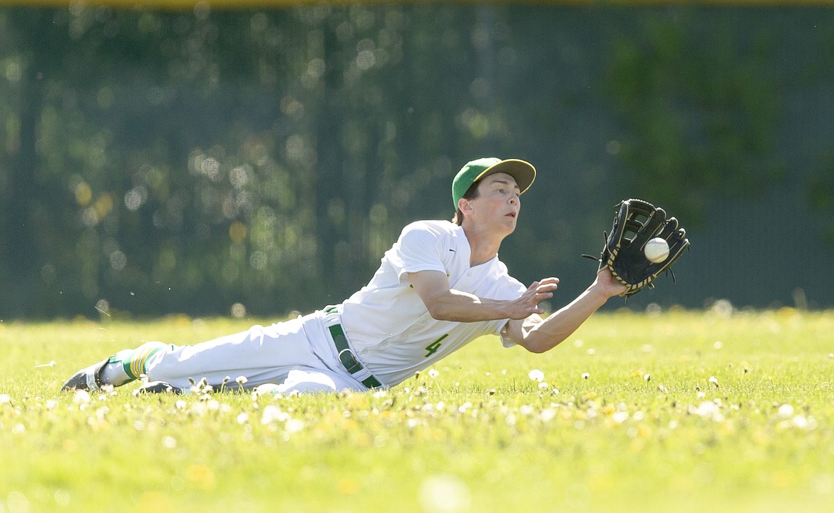 Photo by JASON DUCHOW PHOTOGRAPHY
Lakeland center fielder Collin Bell makes a diving catch against Sandpoint on Friday in the deciding game of the 4A Region 1 baseball championship series in Rathdrum.