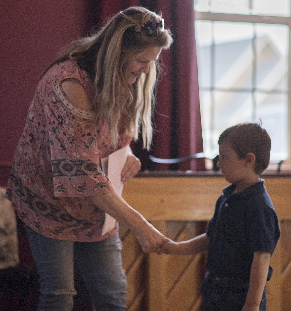 Judy Graham, left, talks about how focused and attentive her student Benjamin Repine is in class, Monday at a school board meeting in Libby. Teachers also recognized students Braylin Brooks, Elise Erickson, Kinley Hill, Ryan Beagle and Maicy Munra-Svendsbye (Luke Hollister/The Western News)