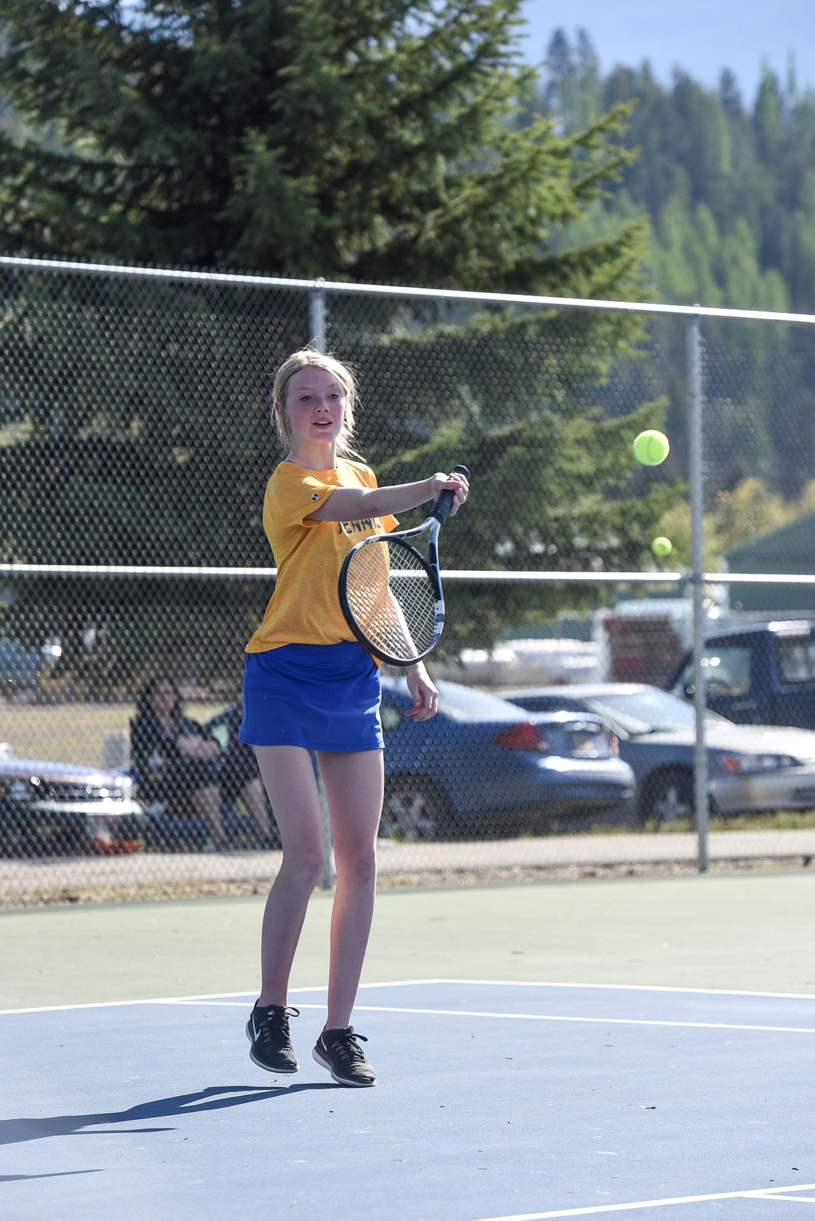 Libby sophomore Annika Thorstenson hits a return, May 10 against Columbia Falls. (Ben Kibbey/The Western News)