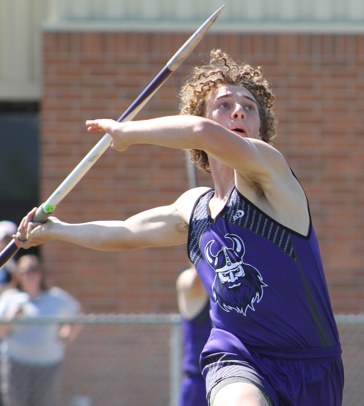 CHARLO HIGH School javelin thrower Nick Daugherty completes an attempt during the Class 13-C, 14-C District Track Meet Saturday afternoon in Missoula. Daugherty was one of many Charlo Viking track standouts as the both the boys’, and girls’ team brought home plenty of hardware during the District Meet. (Magggie Dresser/Mineral Independent-Valley Press)