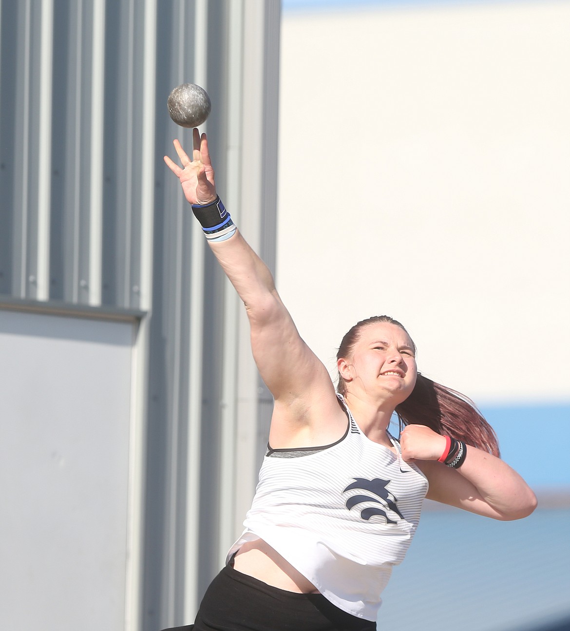 Lake City's Chelsea Reynolds competes in the shotput at Thursday's 5A/4A Region 1 track meet at Coeur d'Alene High School. (LOREN BENOIT/Press)