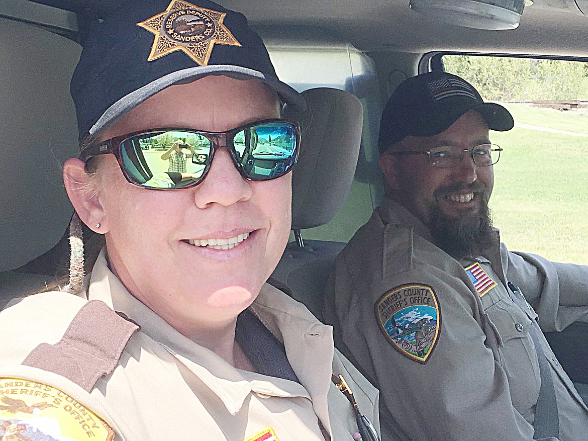 THIS YEAR&#146;S Torch Run coordinator, Reserve Deputy Brandi Jones and her husband, Reserve Deputy Dan Jones, joined the parade.