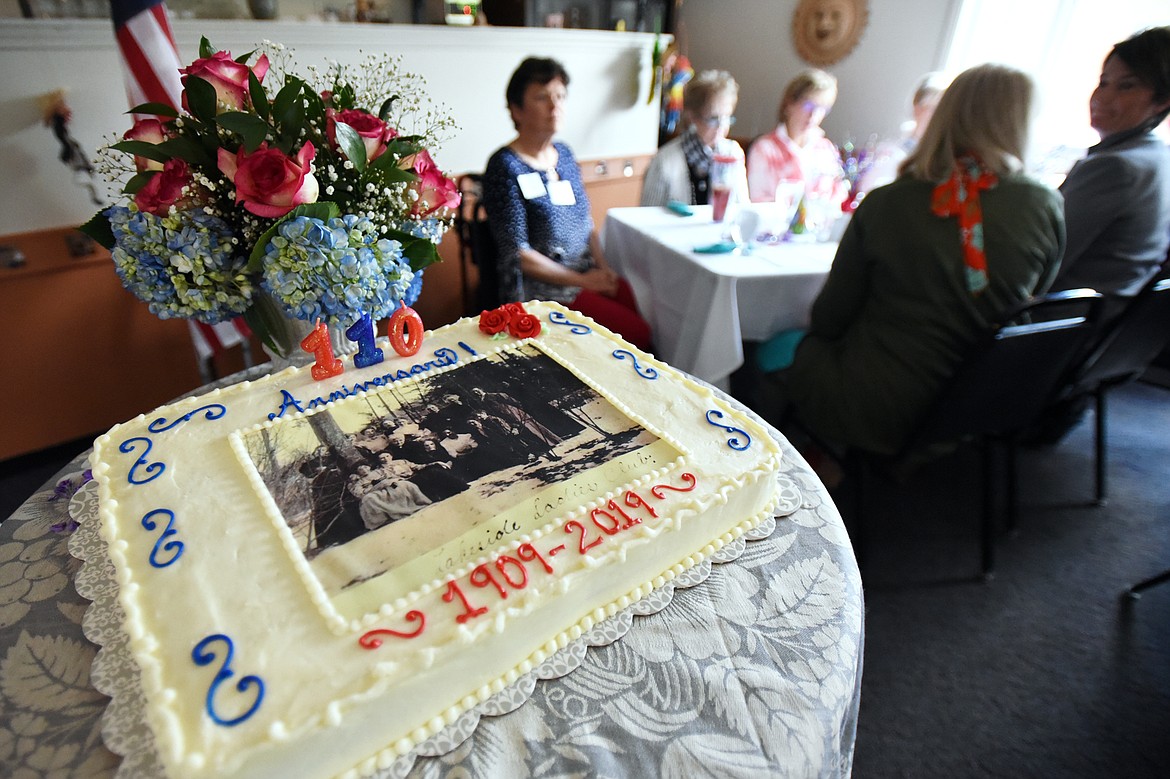 A celebratory cake at the 110th anniversary meeting of the Lakeside Community Club at Vista Linda Mexican &amp; Catering in Somers on Wednesday, May 8. The photo on the cake is from a 1911 meeting of the Lakeside Ladies Club at the Grub House on the R. Skookum Ranch. (Casey Kreider/Daily Inter Lake)