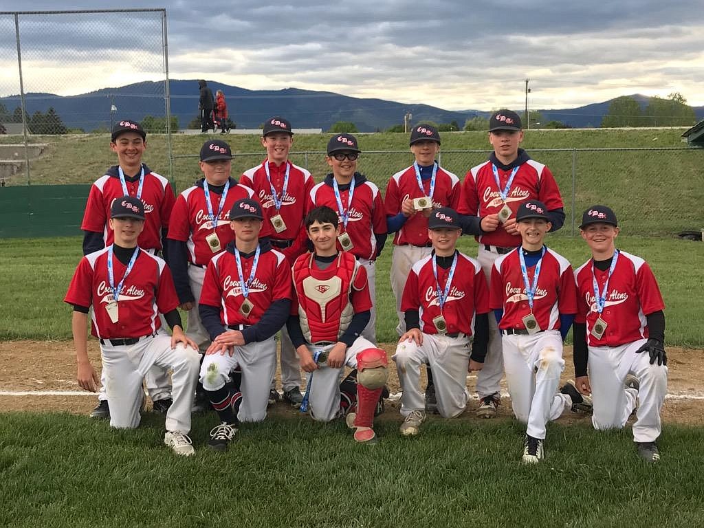 Courtesy photo
The Coeur d&#146;Alene Lumbermen 13-and-under baseball team traveled to Missoula to play in a 18-team tournament May 17-19. The Lums went 4-1-1 over the weekend on their way to capturing the championship over the host team Missoula Bandits. In true Montana fashion the boys received a custom belt buckle for their achievements. In the front row from left are AJ Currie, Nolan Christ, Calvin Coppess, Jake Dannenberg, Karl Schwarzer and Richie Hackett; and back row from left, Kyle Seman, Logan Davis, Trevor Rodda, Cooper Smith, Paxson Bunch and Braeden Newby.