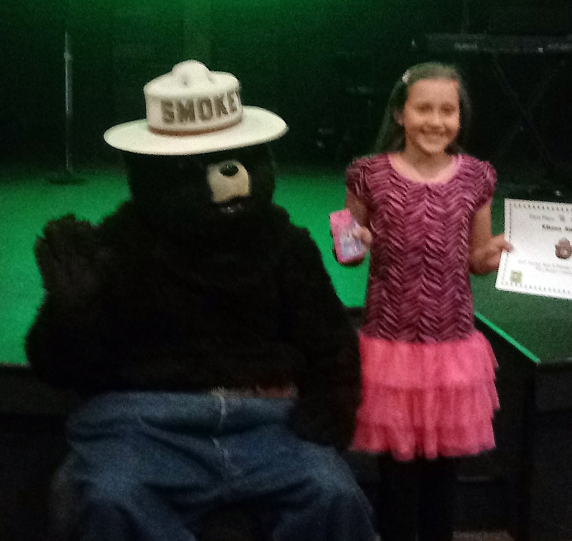 (Photo courtesy SUSAN PECKHAM)
Idaho first-place winner, Eliana Shukle, poses with Smokey Bear at her school, House of the Lord Christian Academy in Oldtown.