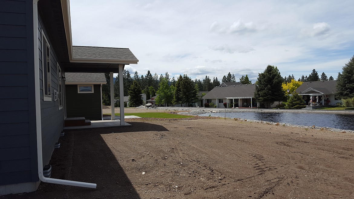 The backyard view of the water at Waterside at Prairie Falls. Homes will come with included front and backyard landscaping.